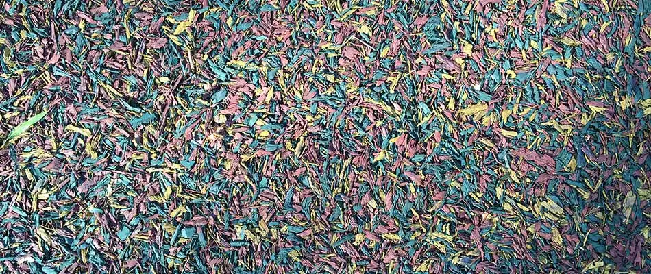 Multi-colored rubber mulch installed on a playground in Rancho Santa Fe, CA.
